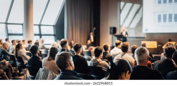 speaker-giving-talk-conference-hall-260nw-2622968815.jpg.webp